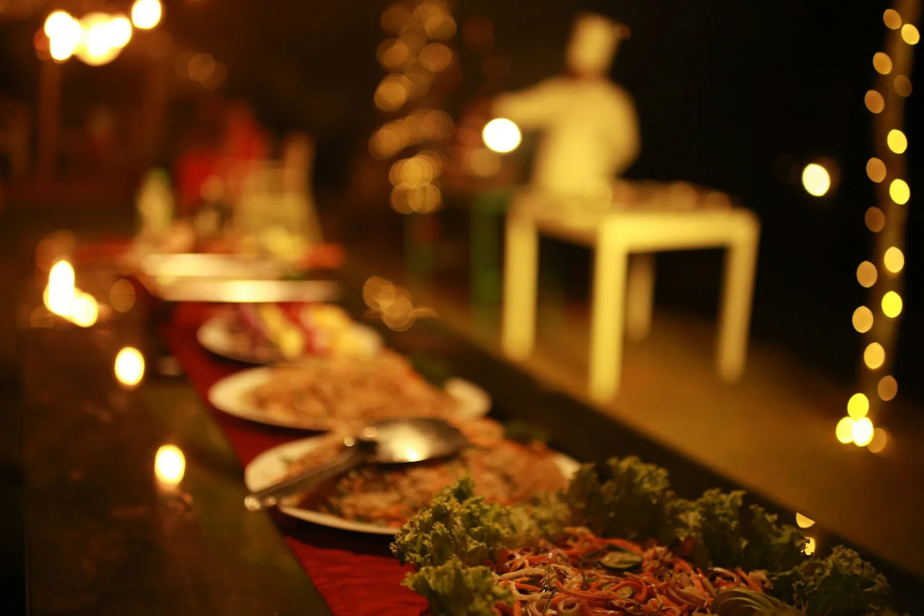 A Sri Lankan hospitality team preparing an evening table